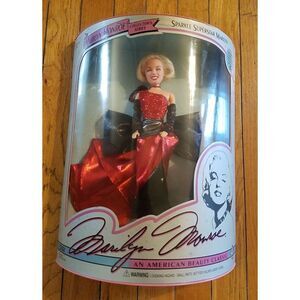 Marilyn Monroe Doll in Shimmering Red Gown with Black Bow Accent